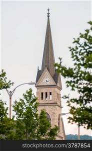 church steeple seen in a city