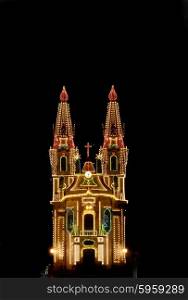 church with christmas light in the night