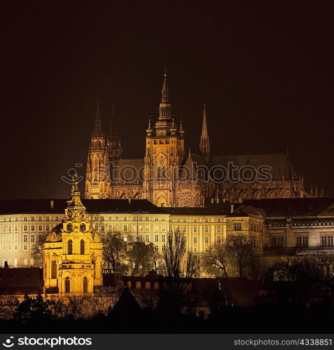 Churches and castle lit up at night