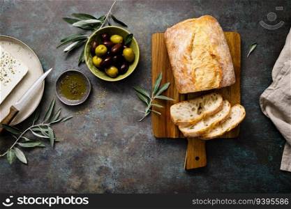 Ciabatta, feta cheese and olives, top view