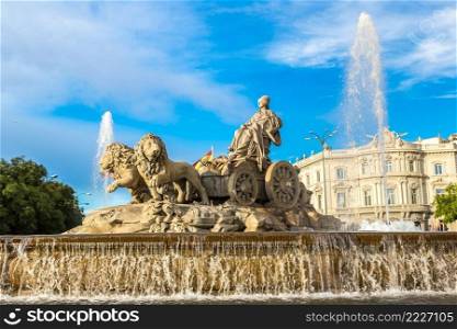 Cibeles fountain at Plaza de Cibeles in Madrid in a beautiful summer day, Spain
