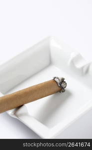 Cigar and ashtray