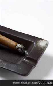 Cigar and ashtray
