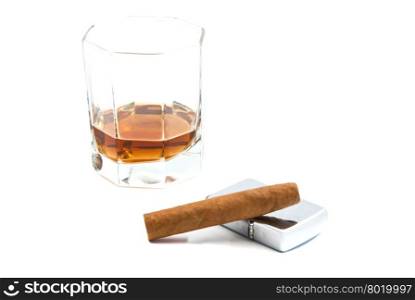 cigar, cognac and metal lighter on white background closeup