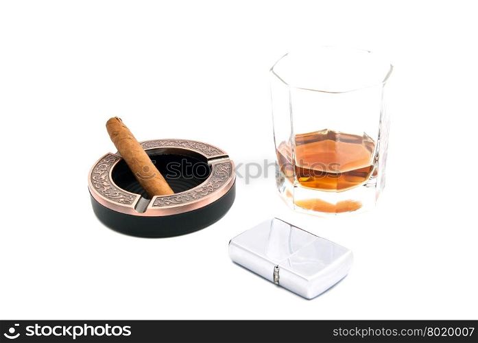 cigar in ashtray, cognac and lighter on white background