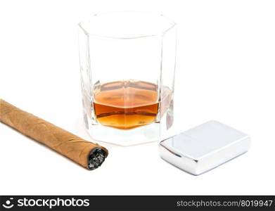 cigar, lighter and glass of cognac on white