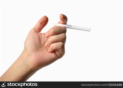 cigarette in girl hand risk concept