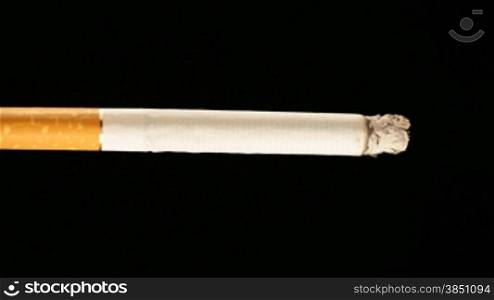 cigarette smoking macro isolated on black