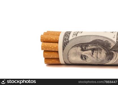 Cigarettes and money on a white background