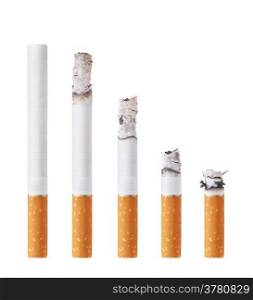 Cigarettes during different stages of burn. Isolated on white