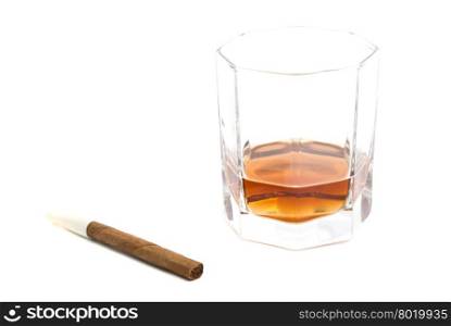 cigarillo and glass of cognac on white background
