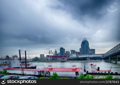 Cincinnati skyline. Image of Cincinnati skyline and historic John A. Roebling suspension bridge cross Ohio River.