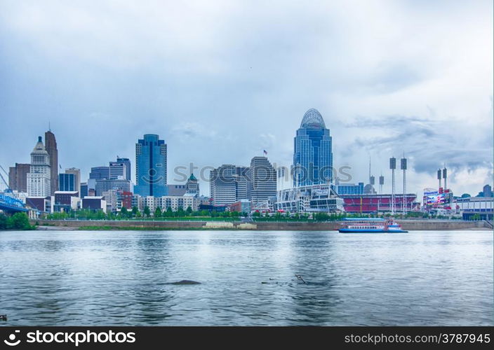 Cincinnati skyline. Image of Cincinnati skyline and historic John A. Roebling suspension bridge cross Ohio River.