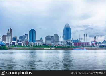 Cincinnati skyline. Image of Cincinnati skyline and historic John A. Roebling suspension bridge cross Ohio River.