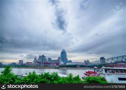 Cincinnati skyline. Image of Cincinnati skyline and historic John A. Roebling suspension bridge cross Ohio River.