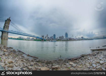 Cincinnati skyline. Image of Cincinnati skyline and historic John A. Roebling suspension bridge cross Ohio River.