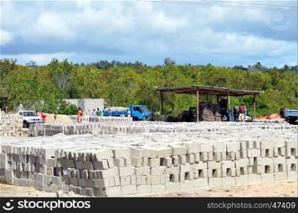 Cinder block factory dry in the sun in a village in Zanzibar