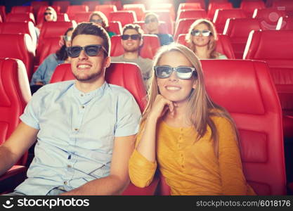 cinema, entertainment and people concept - happy friends with 3d glasses watching movie in theater