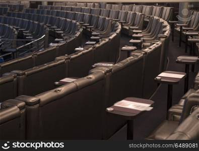 cinema of the armchair is in a semicircle in rows.. cinema of the armchair