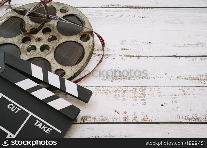 cinema reel with clapperboard. Resolution and high quality beautiful photo. cinema reel with clapperboard. High quality beautiful photo concept