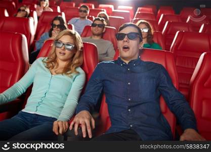 cinema, technology, entertainment and people concept - friends with 3d glasses watching horror or thriller movie in theater
