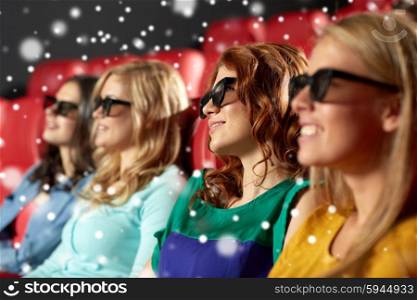 cinema, technology, entertainment and people concept - happy female friends with 3d glasses watching movie in theater with snowflakes