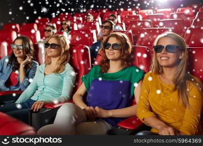 cinema, technology, entertainment and people concept - happy female friends with 3d glasses watching movie in theater with snowflakes