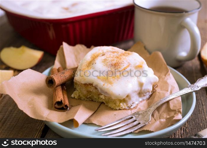 cinnamon buns with cheese cream and cup tea