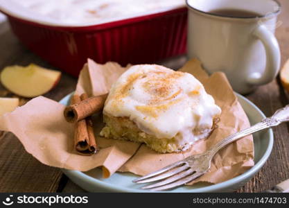 cinnamon buns with cheese cream and cup tea