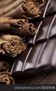 Cinnamon, Dark chocolate with candy sweet. Dark chocolate with candy sweet, dessert food, cinnamon