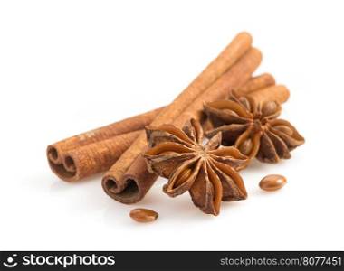 cinnamon sticks and anise star isolated on white background