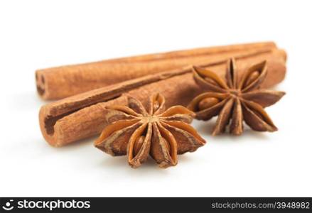cinnamon sticks and anise star on white background