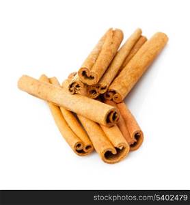 Cinnamon sticks close up isolated on white