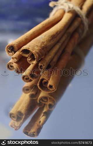 cinnamon sticks on wooden background