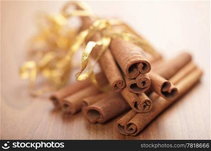 cinnamon with golden ribbon