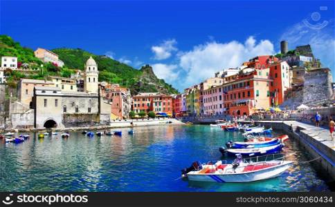 Cinque terre, Famous national park in Liguria, Italy. Vernazza village with colorful fishing boats