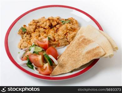 Circassian chicken, shredded breast in a walnut sauce, served with salad and bread