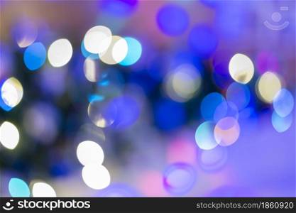 Circle bokeh form party light. Blue Festive elegant abstract background with bokeh lights and stars