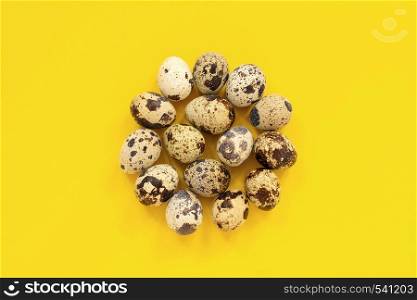 Circle set quail eggs on yellow paper background. Easter concept. Template Creative Flat lay Top view.. Circle set quail eggs on yellow paper background Easter concept. Template Creative Flat lay Top view