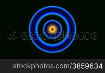 Circles and rings flicker on a black background