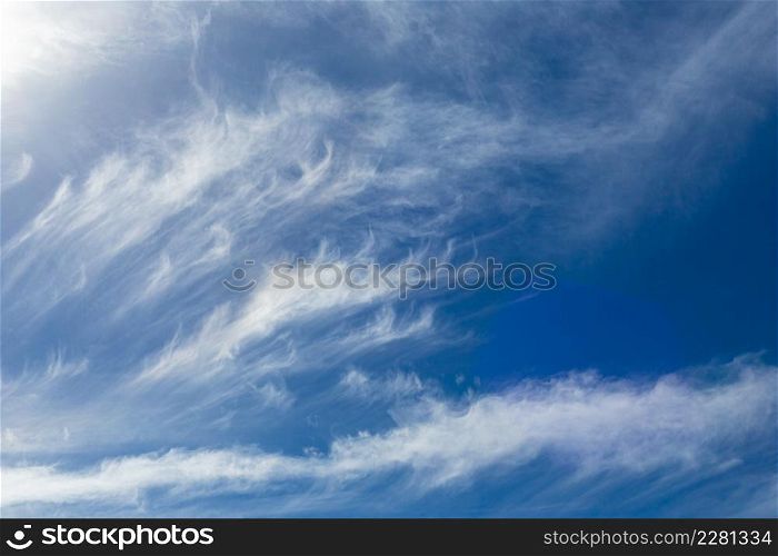 Cirrus and Stratus clouds in dramatic blue sky over Cape Town South Africa