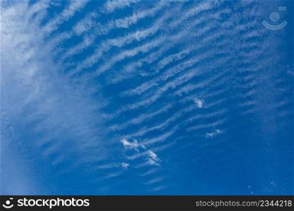 Cirrus and Stratus clouds in dramatic blue sky over Cape Town South Africa