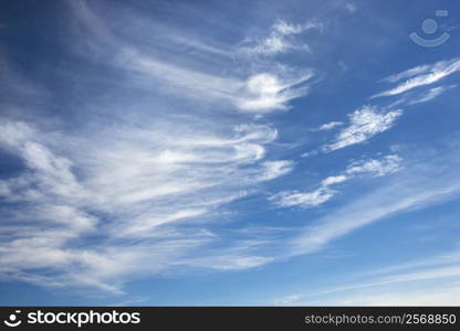 Cirrus clouds in blue sky.