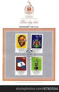 CISKEI (AFRICA) - CIRCA 1981: A stamp series printed in Ciskei (Africa) on First Day of Issue Envelope celebrating their independence shows State Emblems, Flag and President Sebe, circa 1981