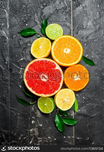 Citrus with leaves. On rustic background. Citrus with leaves.