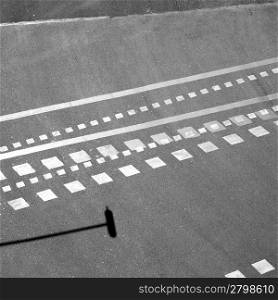 City asphalt lines and shadow aerial view in Barcelona