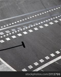 City asphalt lines and shadow aerial view in Barcelona