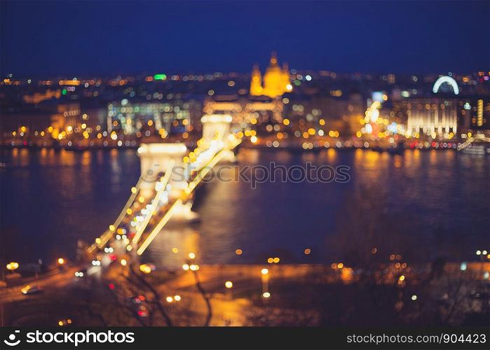 City at night in blur bokeh lights. Night modern city abstract background