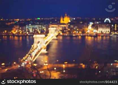 City at night in blur bokeh lights. Night modern city abstract background