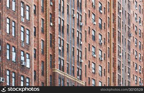 City building facade with pattern windows effect in row